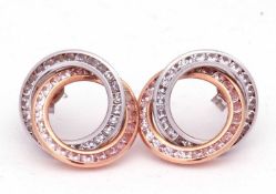 Pair of 9ct two tone coloured earrings, a design featuring entwined circles and highlighted with