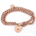 Antique 9ct rose gold double curb link bracelet, heart padlock fitting, suspending a 9ct gold St