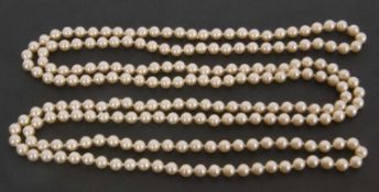 Cultured pearl necklace of opera length with uniform size 6mm cultured beads, 76cm long
