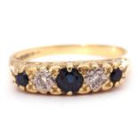 18ct gold sapphire and diamond ring featuring three round cut graduated sapphires and two small