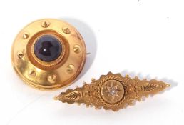 15ct gold and diamond brooch of lozenge shape applied with beads and scrolls, the centre with an old