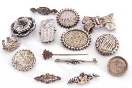 Mainly silver and white metal vintage brooches to include four applied with yellow metal decoration,