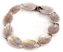 Swedish 'lily pad' bracelet consisting of ten oval links with engraved detail, 19cm long, marked