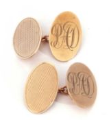 Pair of 9ct gold cuff links, oval panels, one panel engine turned decorated, the other with an