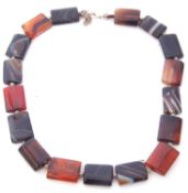 Modern agate panelled necklace featuring 17 various oblong shaped agates joined to a 925 lobster