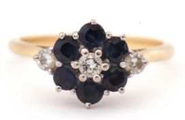 18ct gold sapphire and diamond cluster ring, the flowerhead design featuring six small round cut