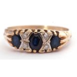 9ct gold sapphire and diamond seven stone ring featuring three graduated oval sapphires, highlighted