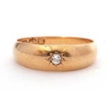 Antique 18ct gold single stone diamond ring, the plain polished design centring a small old cut