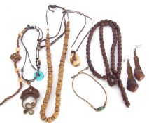 Mixed Lot to include a carved skull bead necklace, plaited hair and carved nut pendant earrings, a