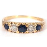18ct gold sapphire and diamond five stone ring featuring three graduated round cut sapphires and two