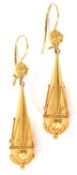 Pair of torpedo drop earrings in Etruscan style, typically decorated with scrolls and beads with