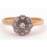 Antique diamond cluster ring, the principal old cut diamond 0.07ct approx, surrounded by eight small