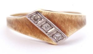 585 stamped ring featuring three small paste stone, offset between angular burnished shoulders, size