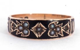 Victorian mourning ring, a continuous band of black enamel, the top section set with small seed