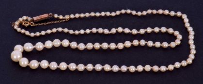 Cultured pearl necklace, a single row of graduated pearls (2mm/6mm) to a 9ct barrel clasp, 26cm