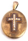 Victorian oval gold hinged locket, the centre applied with an enamel and seed pearl cross and
