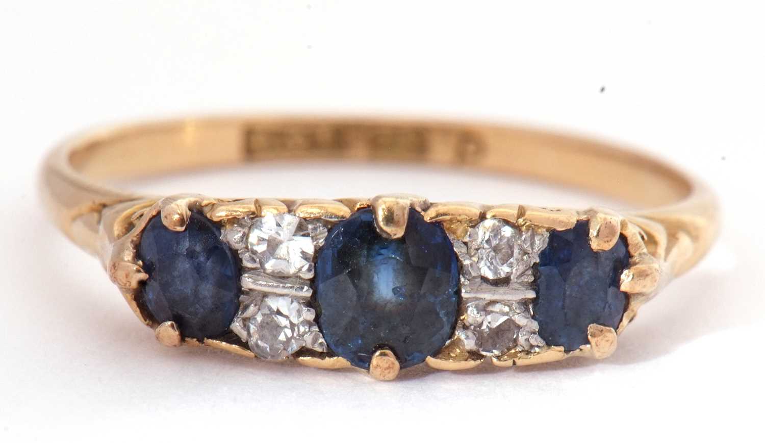 Sapphire and diamond seven stone ring, a design with three graduated oval faceted sapphires, - Image 2 of 7