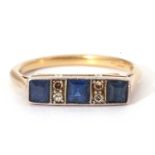 Art Deco sapphire and diamond ring, line set with three square calibre cut sapphires, highlighted
