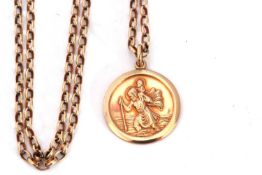 9ct gold St Christopher, Birmingham 1984, 18mm diam, suspended from a 9k stamped chain, g/w 6.3gms