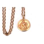 9ct gold St Christopher, Birmingham 1984, 18mm diam, suspended from a 9k stamped chain, g/w 6.3gms
