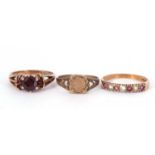 9ct gold garnet cluster ring, size K, a 9ct gold small Emperador coin ring, size J, together with