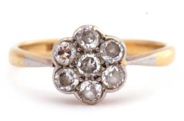 Antique diamond cluster ring with seven old cut diamonds in a flowerhead design, 0.33ct approx,
