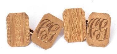 Pair of 9ct stamped cuff links, rectangular shaped panels, one side with initials, verso engine