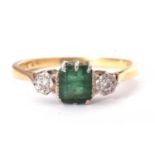 Emerald and diamond three stone ring, the square cut emerald 6mm square, flanked by two small
