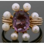 9ct gold amethyst and small pearl ring, the oval faceted amethyst surrounded by small cultured