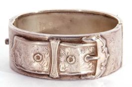 Hallmarked silver hinged buckle bracelet, the top section engraved and applied with a buckle design,