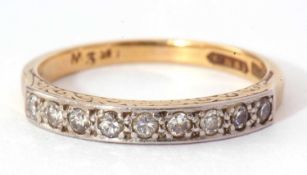 Diamond set half eternity ring featuring nine small single cut diamonds, all between a scroll