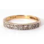 Diamond set half eternity ring featuring nine small single cut diamonds, all between a scroll