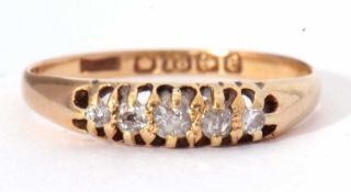 Antique 18ct gold five stone diamond ring featuring five small graduated old cut diamonds,