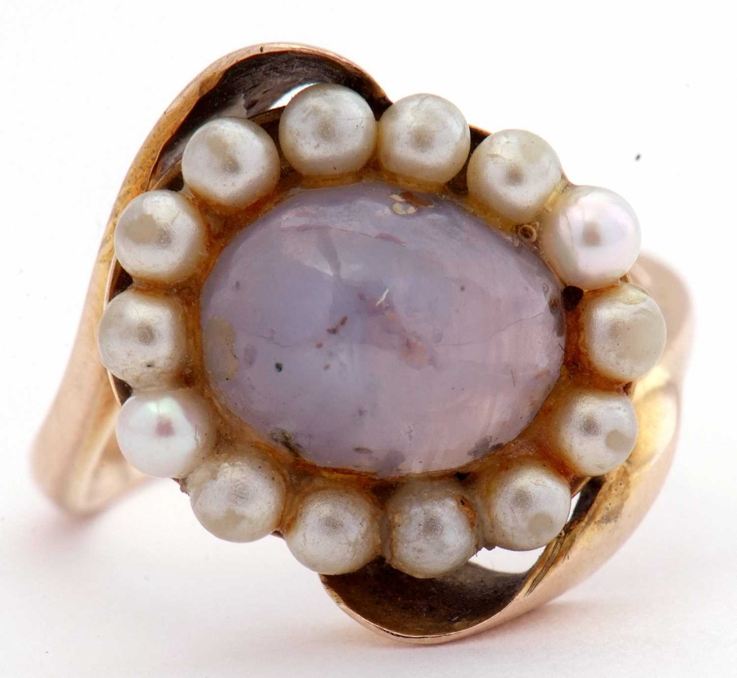 Modern moonstone and seed pearl ring, the cabochon moonstone within a seed pearl surround, between - Image 2 of 9