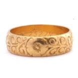 18ct gold ring chased and engraved throughout with scrolls and flowers, London 1967, 5.2gms, size M