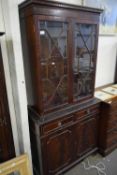 MAHOGANY TWO-SECTION BOOKCASE CABINET WITH DRAWER AND CUPBOARD BASE