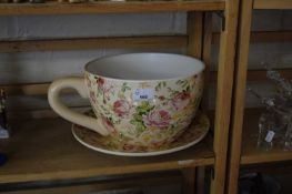 MODERN JARDINIERE FORMED AS A CUP AND SAUCER