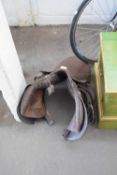 BROWN LEATHER SADDLE AND STIRRUPS