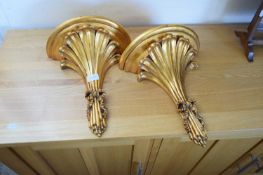 PAIR OF REPRODUCTION COMPOSITION GILT WALL BRACKETS, 34CM HIGH