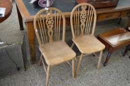 PAIR OF ELM SEATED WHEEL BACK KITCHEN CHAIRS