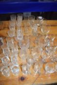 LARGE QUANTITY OF SMALL CLEAR DRINKING GLASSES