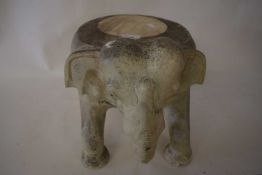 SMALL STOOL FORMED AS AN ELEPHANT