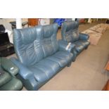 PAIR OF GREEN LEATHER RECLINER TWO-SEATER SOFAS
