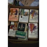 One box of mixed books to include Pan and other paperback books