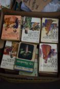 One box of mixed books to include Pan and other paperback books