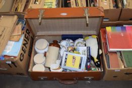 Vintage suitcase containing various assorted teawares, ornaments and Playstation games