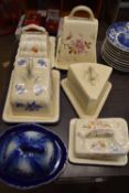 SIX VARIOUS DECORATED CHEESE DISHES