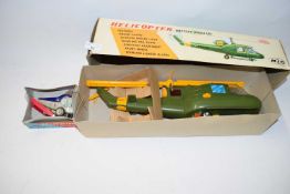 VINTAGE BATTERY OPERATED TOY HELICOPTER AND A FURTHER FRICTION HELICOPTER