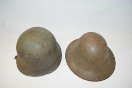 TWO MILITARY HELMETS