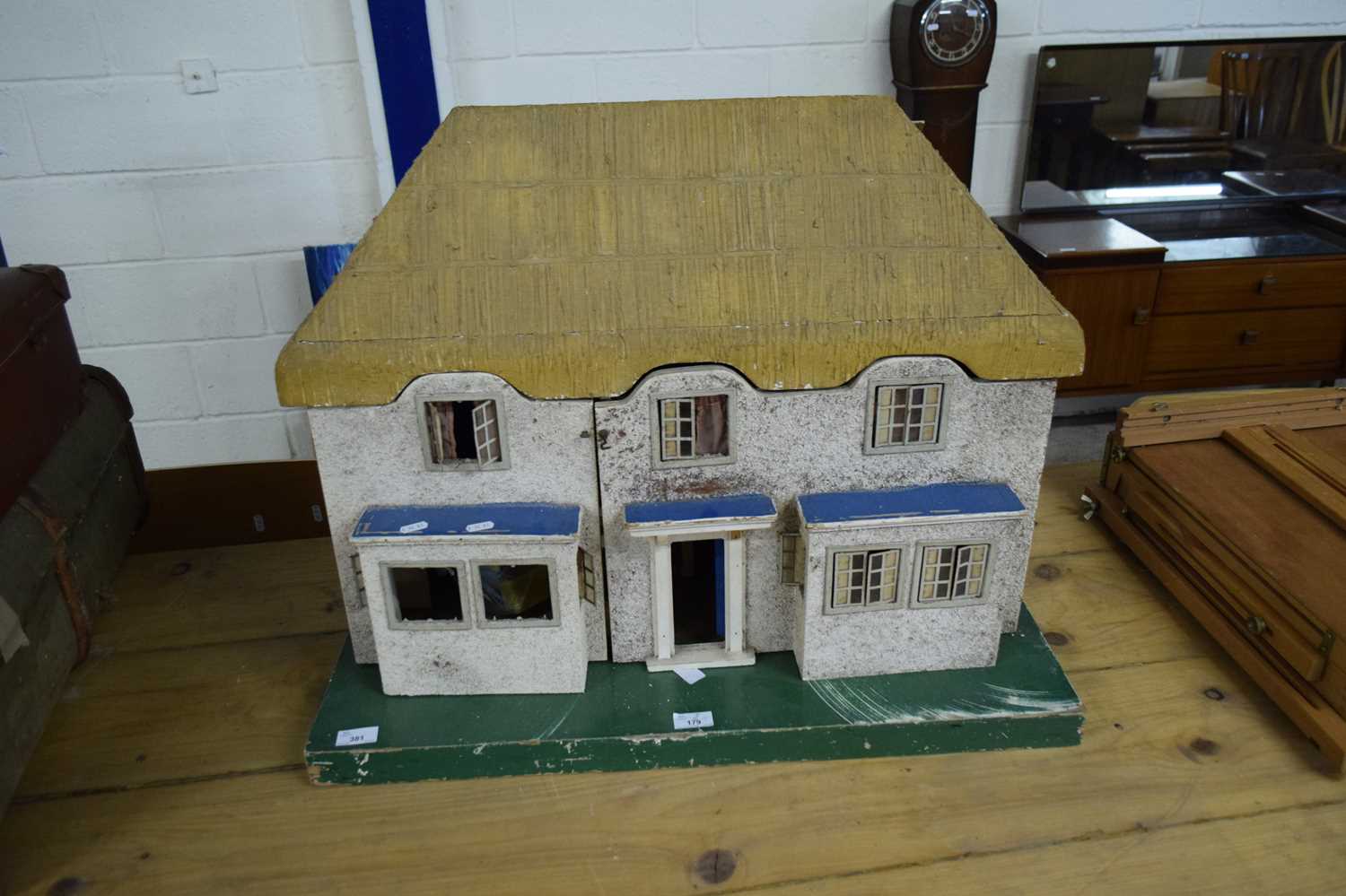 TEXTURED PLYWOOD DOLLS HOUSE WITH SIMULATED THATCHED ROOF, 76CM WIDE